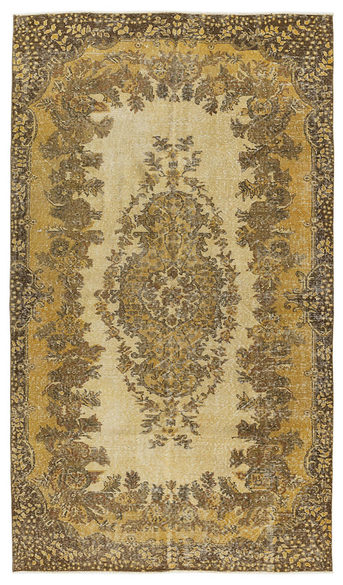 Load image 1 in gallery view. Ochre and brown vintage-style rug with a central floral medallion and ornate border on a cream background.
