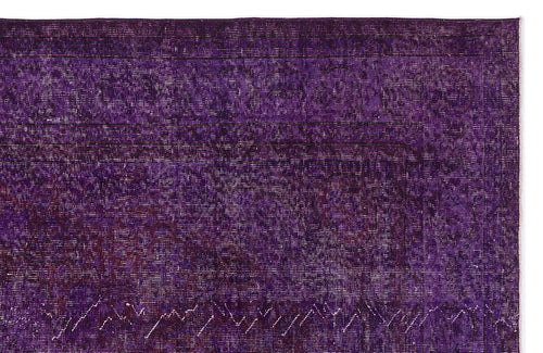 Load image 1 in gallery view. Deep purple vintage-style rug with a faint, distressed traditional medallion pattern on a white background.
