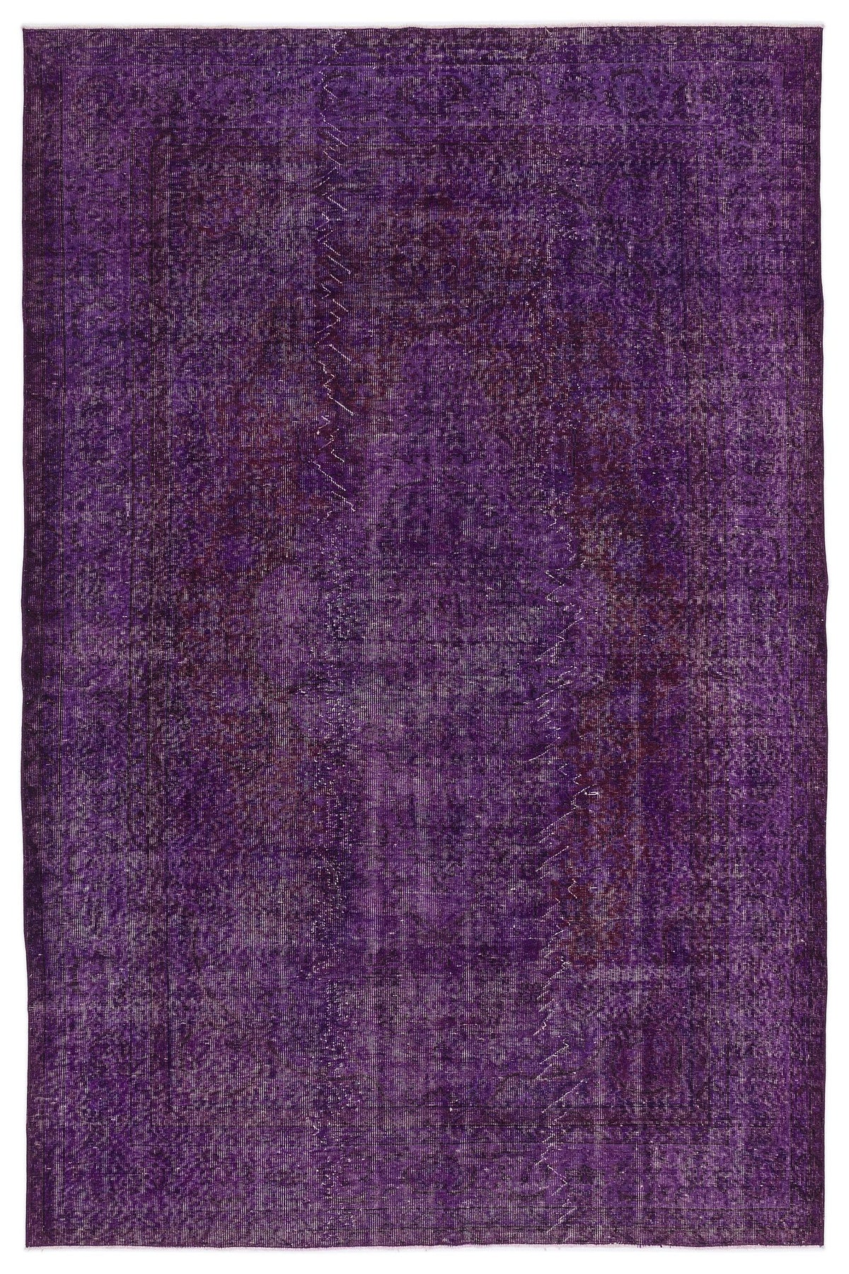 Deep purple vintage-style rug with a distressed, faded traditional medallion pattern.