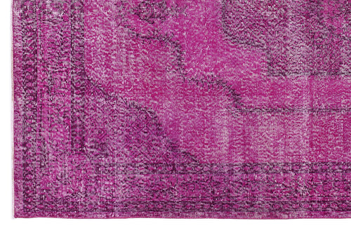 Load image 1 in gallery view. Magenta distressed rug with a faded traditional medallion pattern and a dark border.