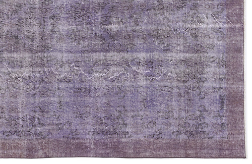 Load image 1 in gallery view. Deep purple distressed rug with a faded, overdyed vintage pattern and a solid border.