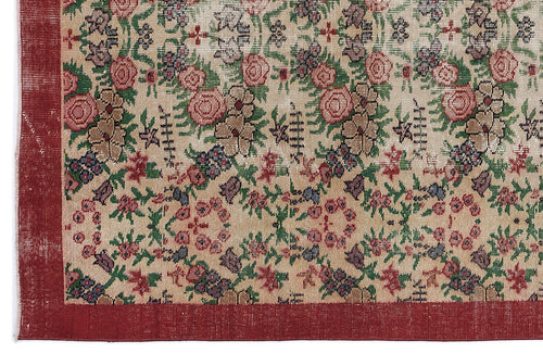 Load image 1 in gallery view. Beige rug with a multi-colored floral pattern and a solid dark red border.