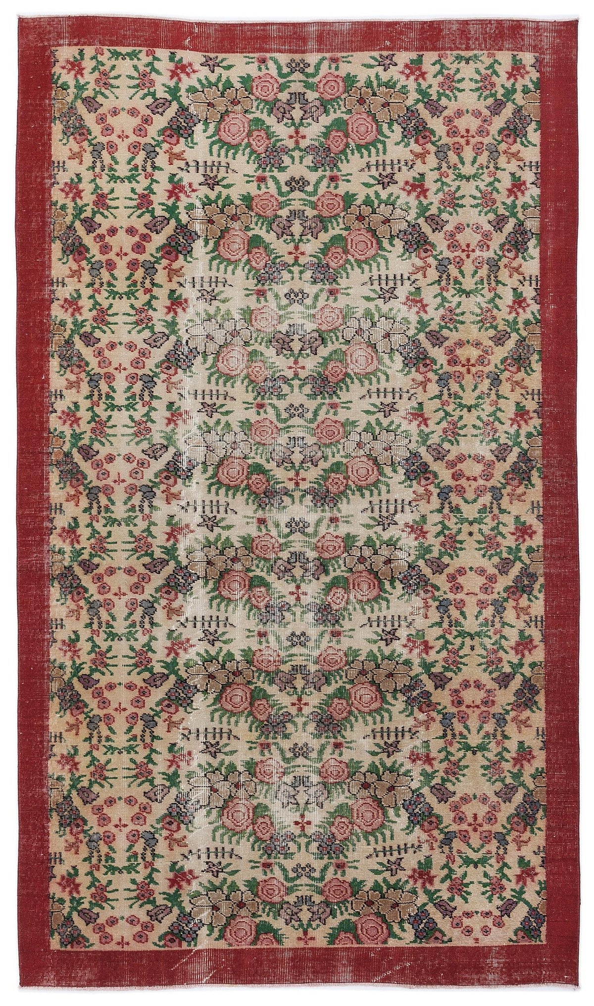 Beige vintage-style rug with a red border and a repeating floral pattern in pink, green, and dark blue.