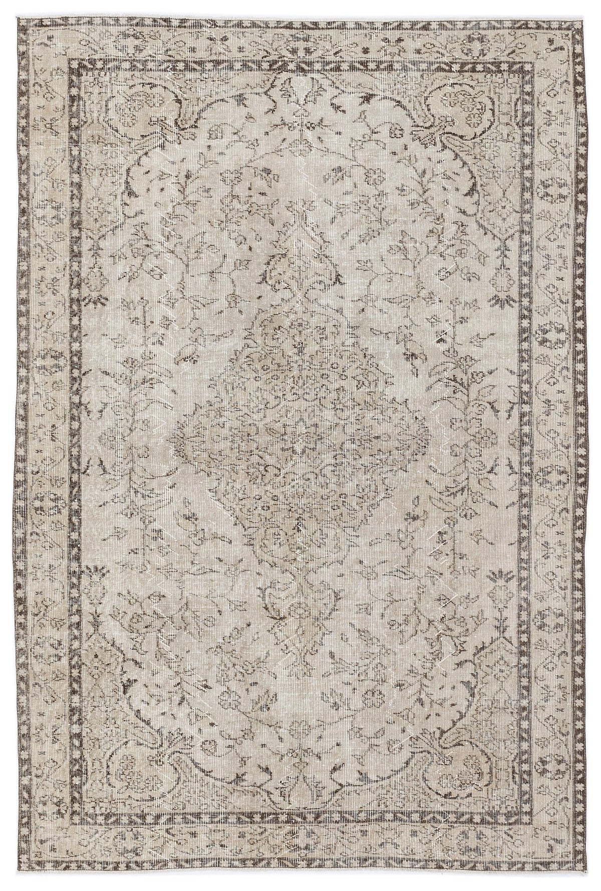 Beige and brown distressed area rug with a traditional floral medallion pattern and a decorative border.