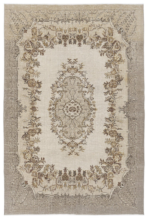Load image 1 in gallery view. Beige and taupe vintage-style rug with a central floral medallion and ornate botanical border on a white background.