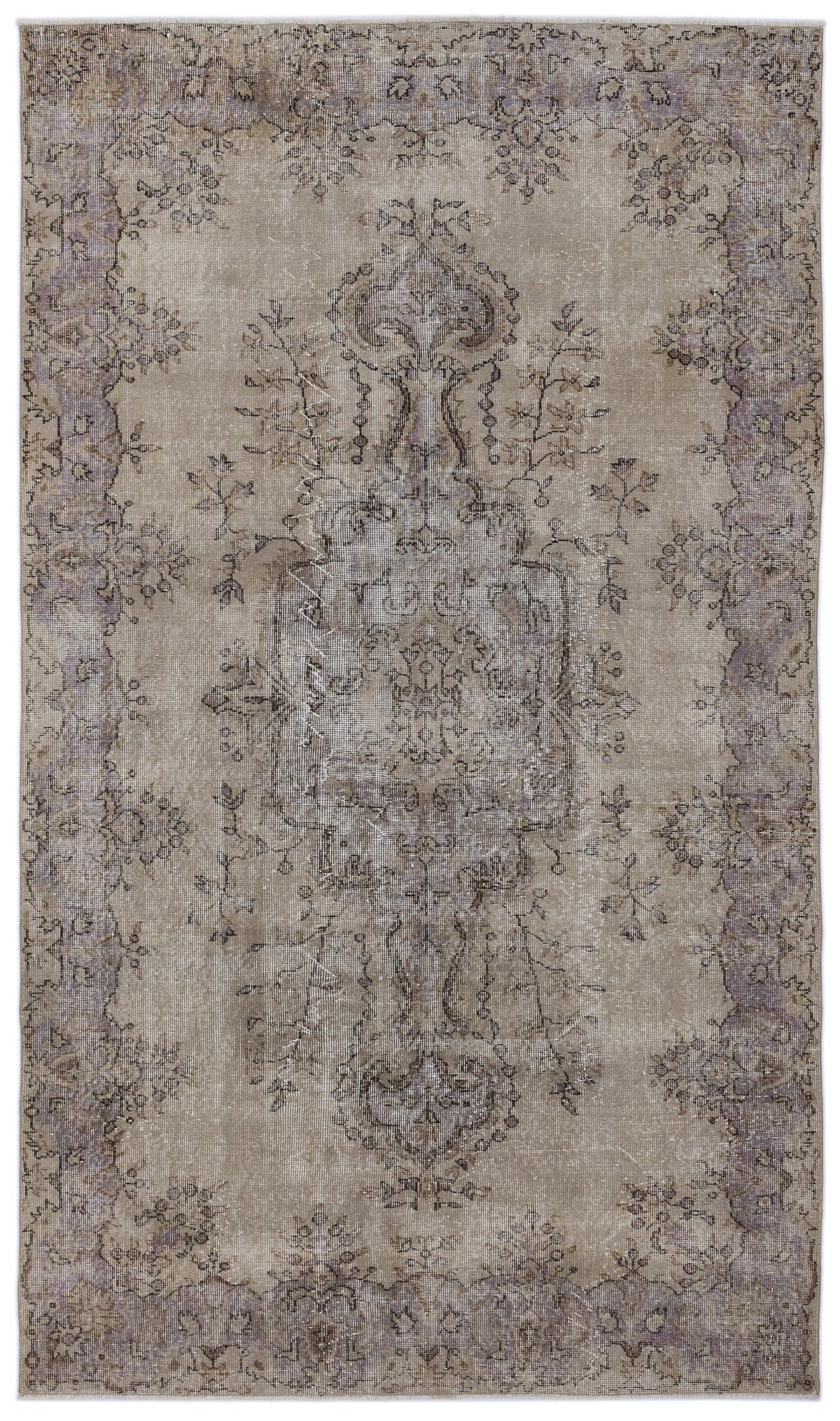Distressed taupe and grey vintage-style rug with a central floral medallion and ornate border.