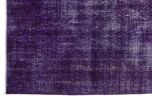 Load image 1 in gallery view. Deep purple vintage-style rug with a distressed, faded texture and subtle tonal medallion pattern.