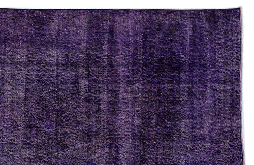 Load image 1 in gallery view. Deep purple vintage-style rug with a distressed, faded texture on a white background.