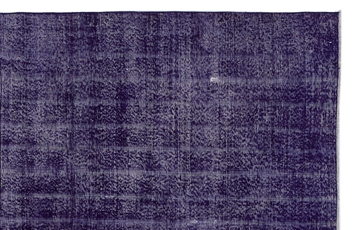 Load image 1 in gallery view. Deep purple rug with a distressed, overdyed texture and visible white woven base.