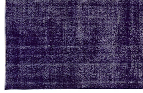 Load image 1 in gallery view. Deep purple vintage-style rug with a distressed, monochromatic texture and subtle grid pattern.