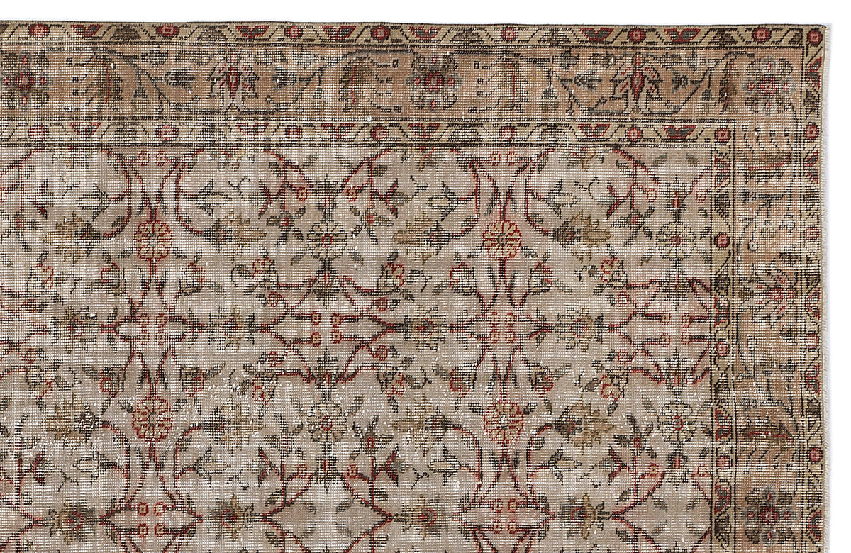 Beige and taupe traditional rug with a repeating floral vine pattern in red and brown, featuring a decorative border.