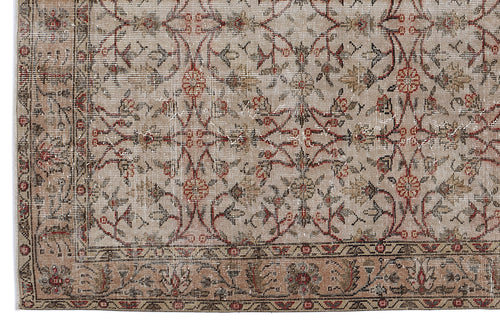 Load image 1 in gallery view. Beige and taupe vintage-style rug with a distressed floral vine pattern and a decorative border.