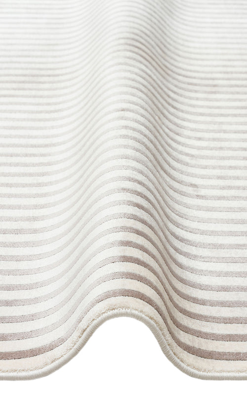 Load image 1 in gallery view. Cream and taupe striped rug with a textured, ribbed pile.