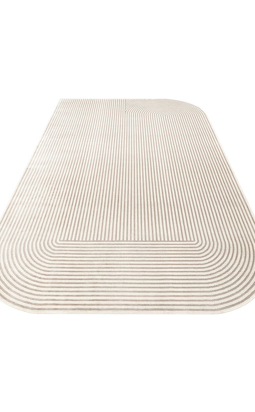Load image 1 in gallery view. Cream and taupe area rug with a rounded corner and a linear, concentric arch pattern on a white background.
