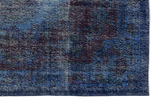 Load image 1 in gallery view. Deep blue and charcoal distressed rug with a traditional floral medallion pattern.