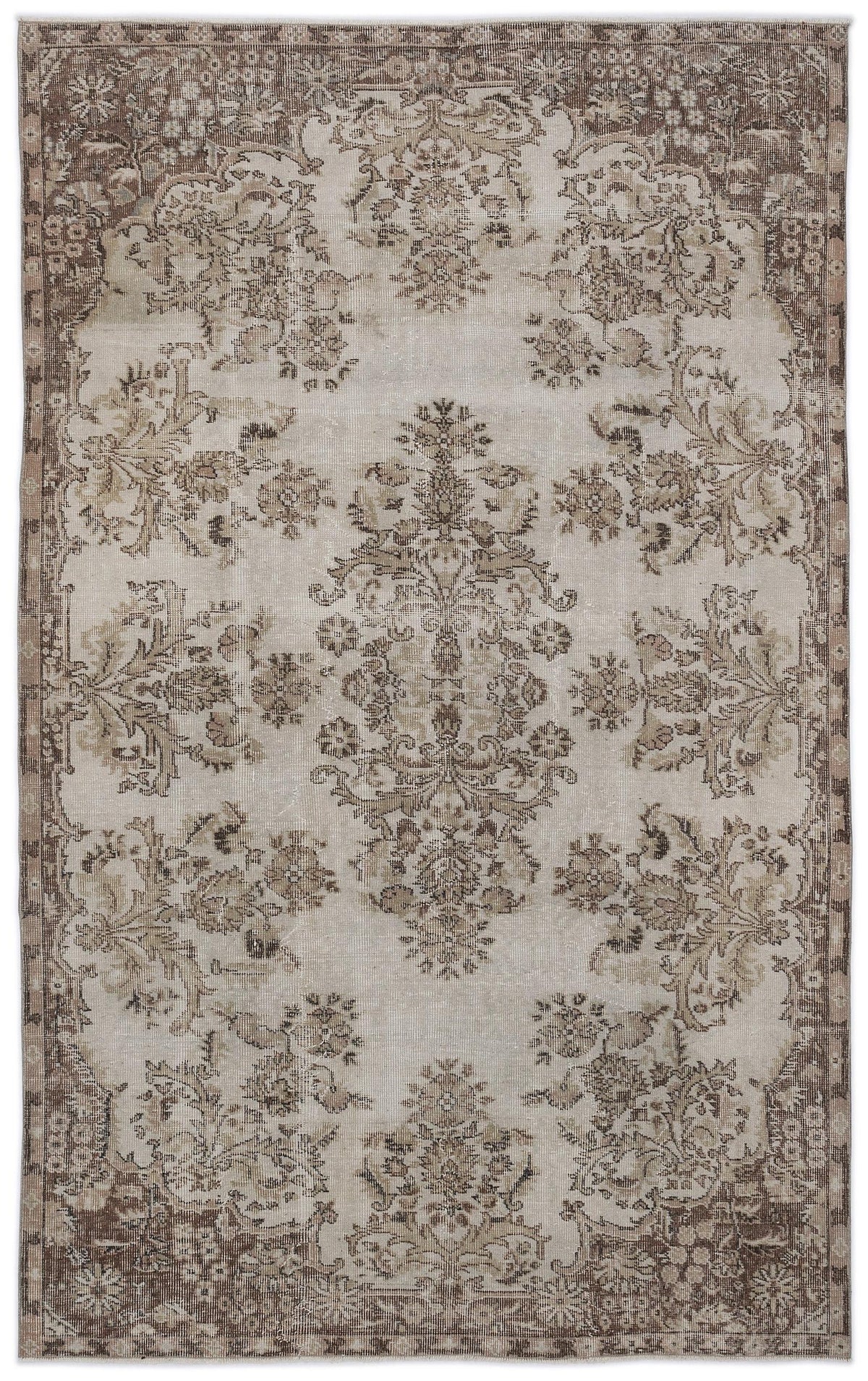Distressed beige and brown traditional rug with a central floral medallion and ornate border pattern.