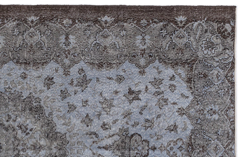 Load image 1 in gallery view. Dark brown and slate blue traditional rug with a distressed floral medallion pattern.