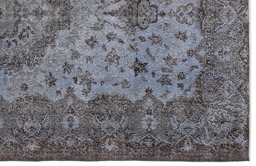 Load image 1 in gallery view. Charcoal and slate blue traditional rug with a distressed, faded floral medallion pattern.