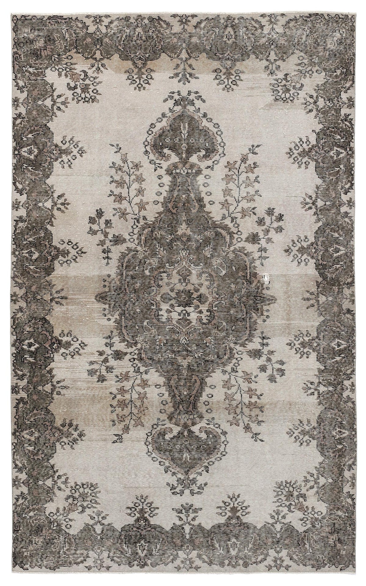 Distressed beige and charcoal grey rug featuring a traditional central medallion and ornate floral border.