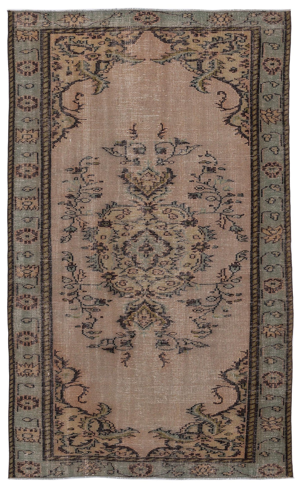 Dusty rose vintage-style rug with a central floral medallion, dark charcoal accents, and a sage green border.