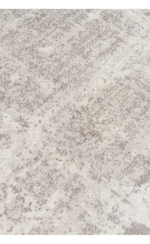 Load image 1 in gallery view. Close-up of a grey and cream rug with a soft, mottled abstract texture.