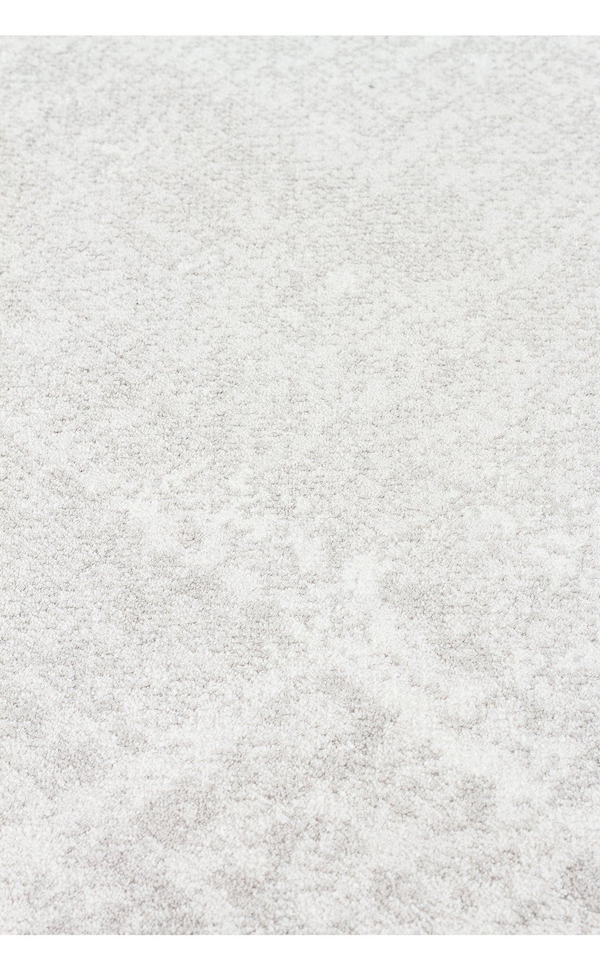 Light gray and white high-pile rug with a subtle, abstract marbled texture.