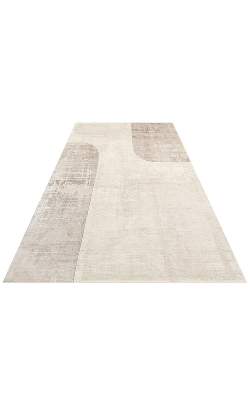 Load image 1 in gallery view. Beige and taupe area rug with an abstract, distressed geometric block pattern on a white background.