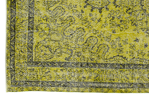 Load image 1 in gallery view. Chartreuse and black rug with a distressed traditional floral pattern and a geometric border.