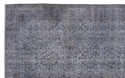 Load image 1 in gallery view. Slate blue and charcoal grey rug with a distressed, traditional floral medallion pattern and a geometric border.