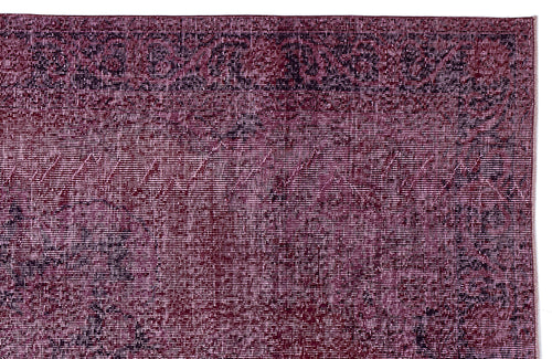 Load image 1 in gallery view. Deep magenta and black distressed rug with a traditional ornate border and faded central medallion pattern.
