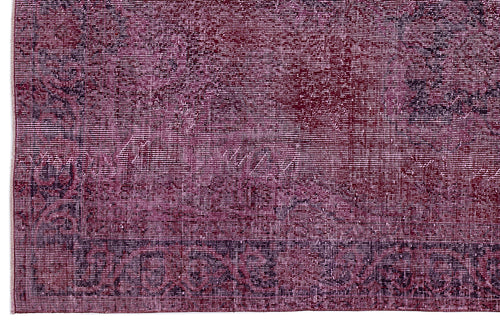 Load image 1 in gallery view. Deep magenta and black distressed vintage-style rug with a faded traditional medallion pattern.