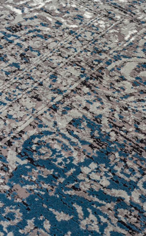Bild 1 in Galerieansicht laden. Grey, blue, and black distressed rug with a faded traditional medallion pattern.