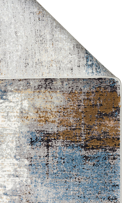 Load image 1 in gallery view. Abstract area rug with a distressed, multi-colored pattern of blue, gold, grey, and black on a white background.