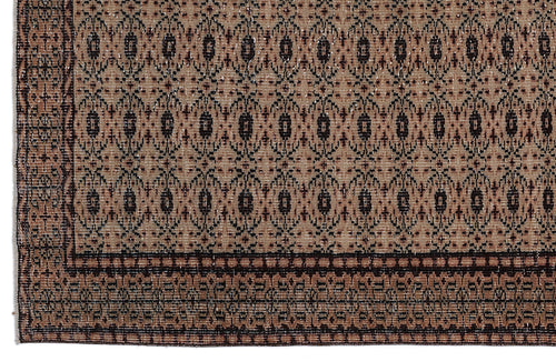 Load image 1 in gallery view. Tan and dark brown rug with a repeating geometric diamond pattern and a wide, detailed border.