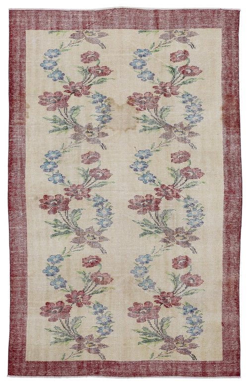 Load image 1 in gallery view. Beige rug with a red border and vertical columns of floral motifs in red, blue, and green.