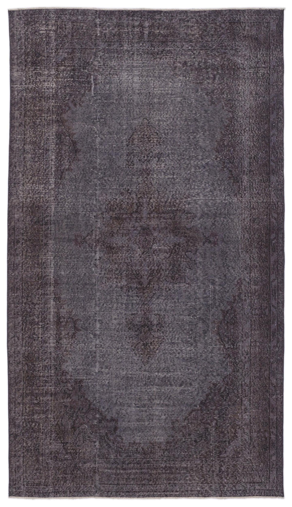 Dark charcoal distressed rug with a faded traditional medallion pattern and a bordered edge.