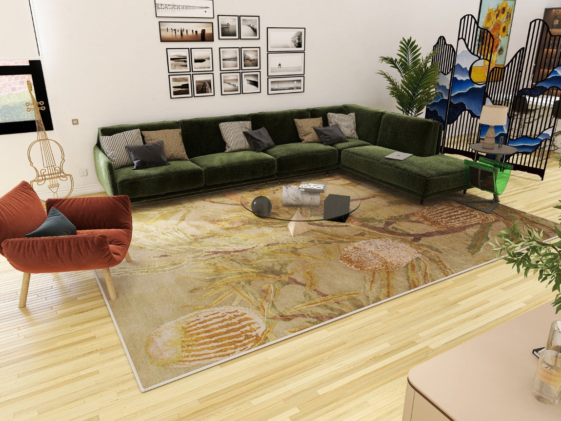 A modern living room with a green sectional sofa, red armchair, glass coffee table, plants, mountain-design folding screen, wall art, light wood flooring, and a large Dreamweaver's Loom - Washable Rug - JRS001 (Custom Size) for high-traffic areas.
