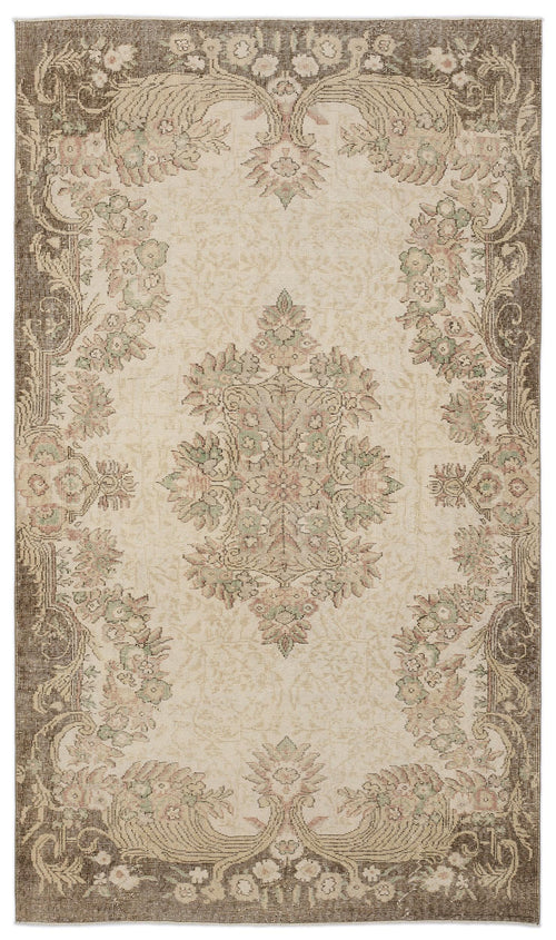 Load image 1 in gallery view. Beige and brown traditional rug with a central floral medallion and ornate border in muted pink and sage green tones.