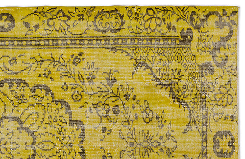 Load image 1 in gallery view. Mustard yellow and charcoal grey rug with a distressed, traditional floral medallion pattern.