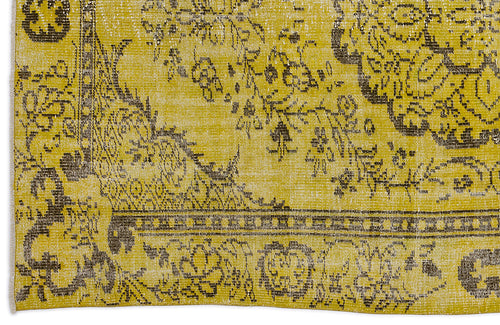 Load image 1 in gallery view. Mustard yellow and charcoal grey distressed rug with a traditional floral medallion pattern and ornate border.