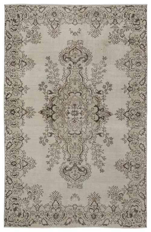Load image 1 in gallery view. Beige and brown vintage-style rug with a distressed central floral medallion and ornate border pattern.