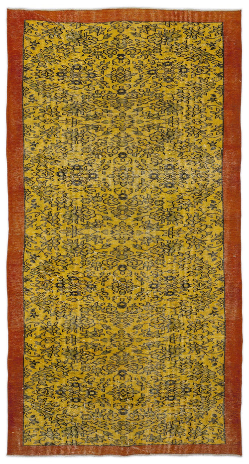 Load image 1 in gallery view. Mustard yellow rug with a black floral medallion pattern and a solid burnt orange border.