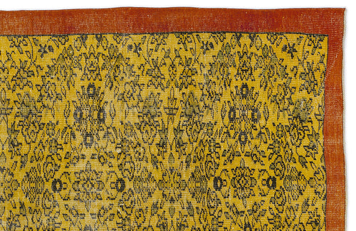 Load image 1 in gallery view. Mustard yellow rug with a black floral medallion pattern and a wide terracotta border on a white background.