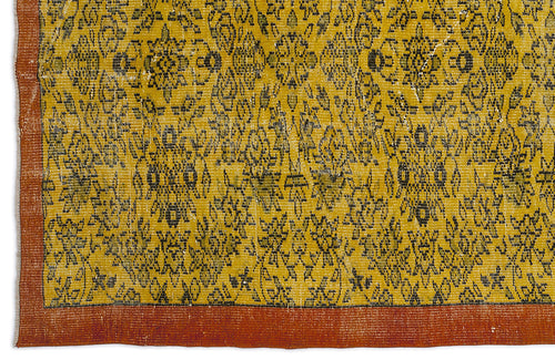 Load image 1 in gallery view. Mustard yellow rug with a black floral medallion pattern and a solid burnt orange border.