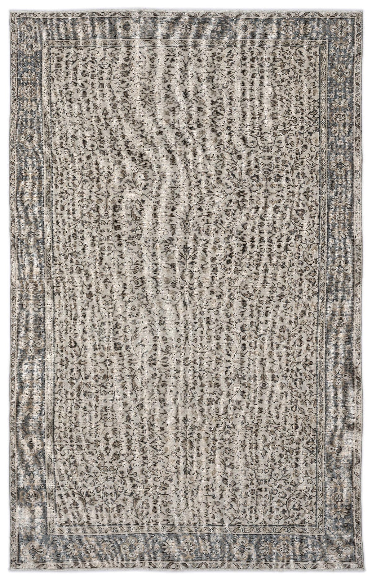 Grey and beige vintage-style rug with a distressed floral pattern and a wide, ornate border.
