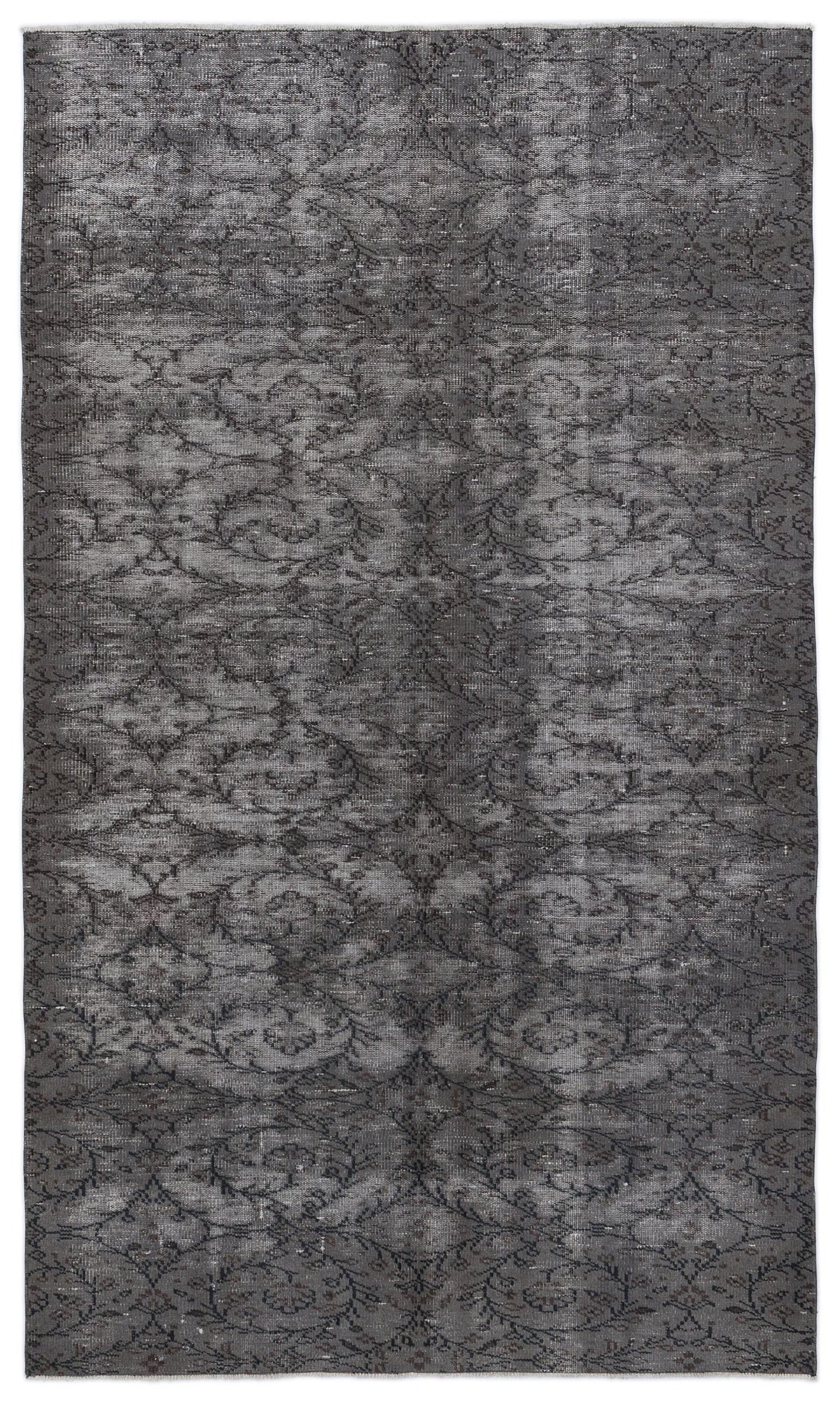 Charcoal grey vintage-style rug with a distressed, repeating floral vine pattern on a white background.