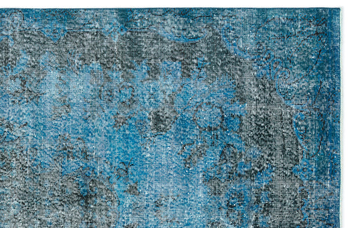 Load image 1 in gallery view. Deep blue and black distressed rug with a faded, traditional medallion pattern on a white background.