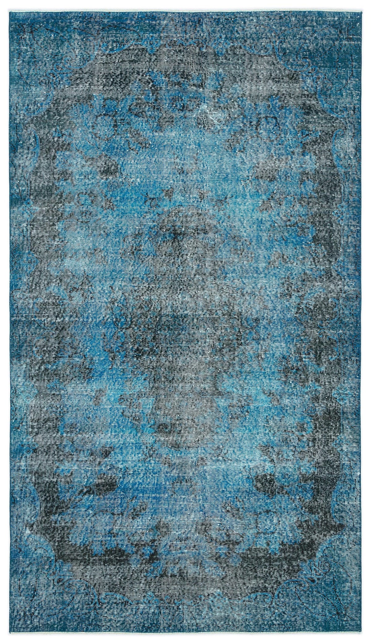 Blue and black distressed rug with a faded traditional medallion pattern on a white background.