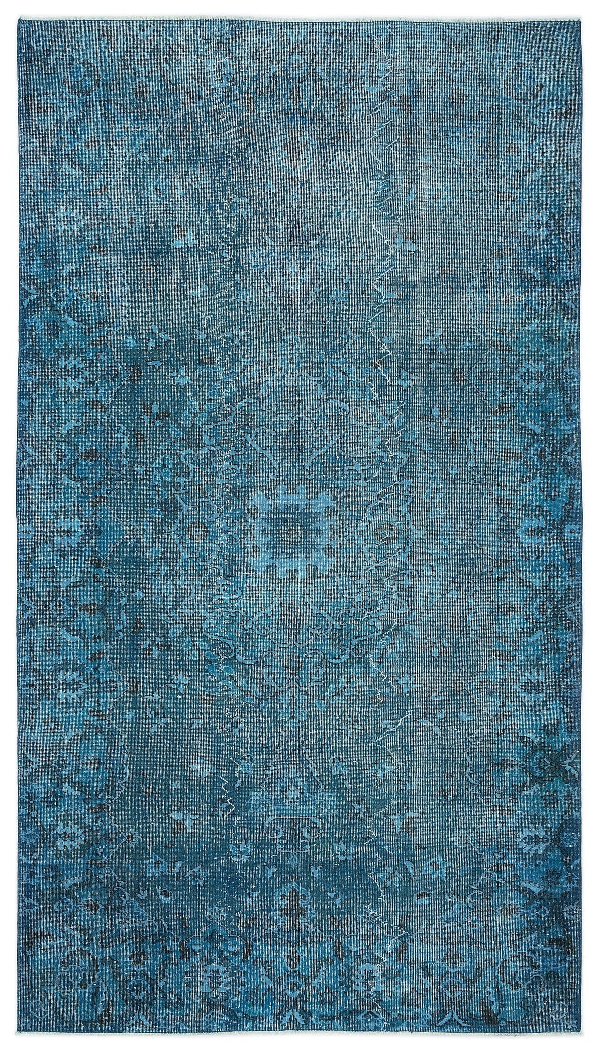 Deep blue distressed rug with a faded traditional medallion pattern and intricate floral border details.