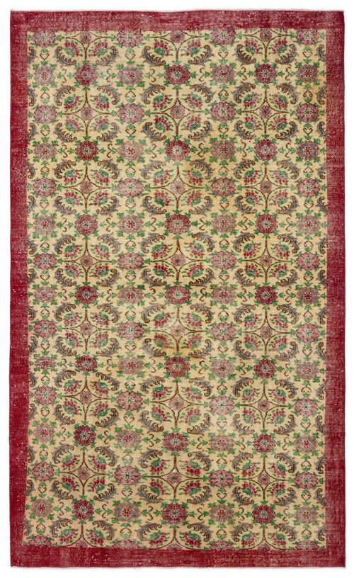 Load image 1 in gallery view. Beige rug with a red border and a repeating floral medallion pattern in red, green, and blue.